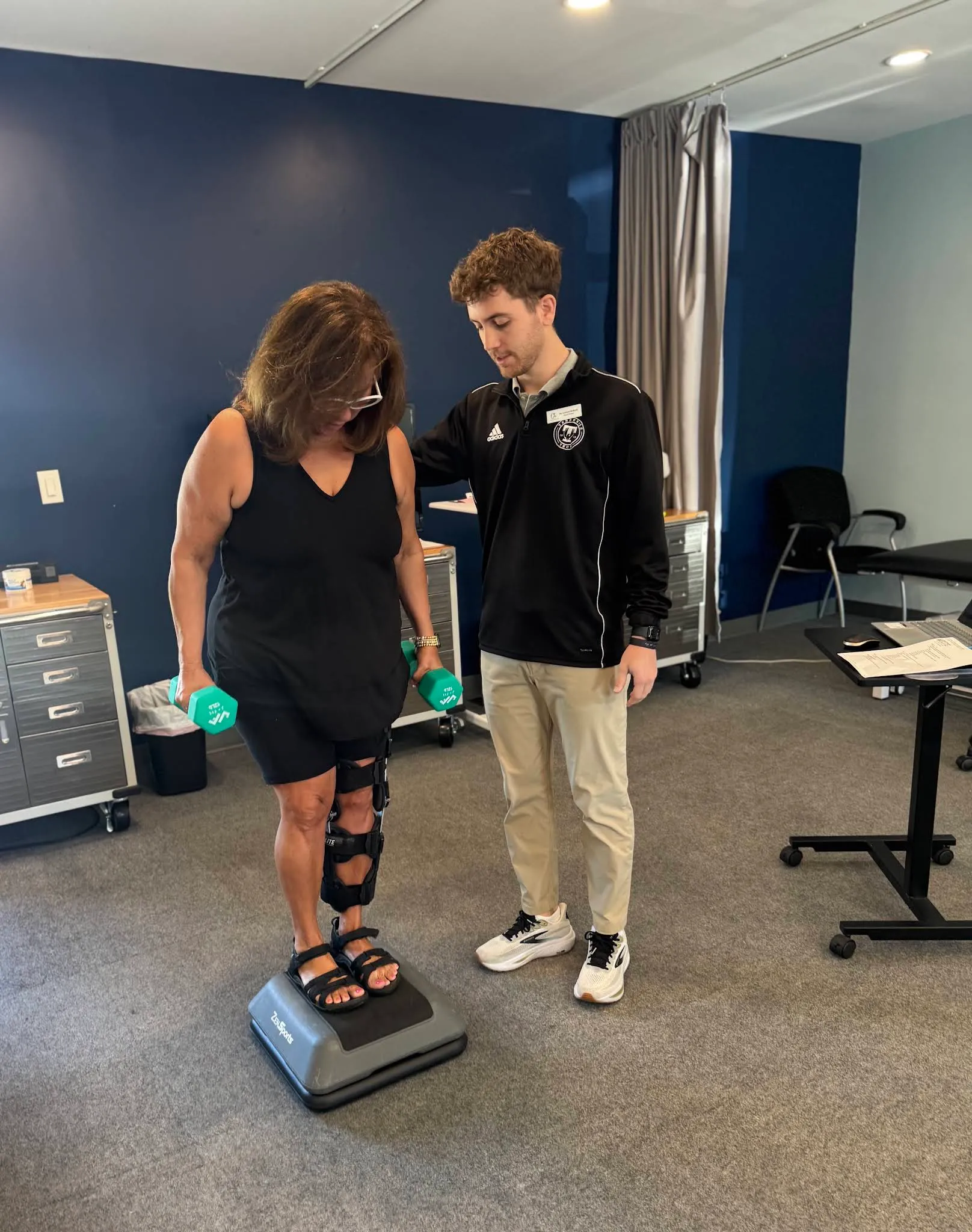 A Beyond Physical Therapy clinician guiding a patient through strengthening before or after surgery.