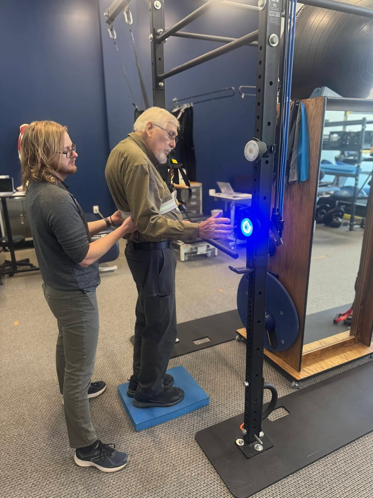 A Beyond Physical Therapy clinician guiding a patient through one-on-one movement work.